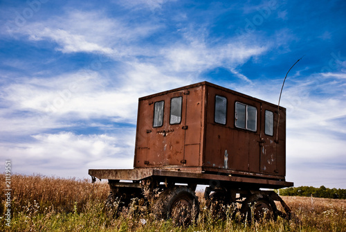 rusty van at summer meadow