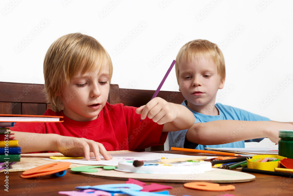 The boys of school return drawing on a paper clean sheet The boys of school return drawing on a paper clean sheet