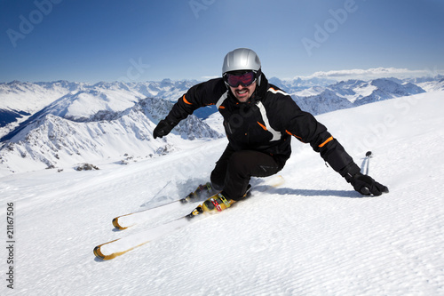 Male skier with mountain view