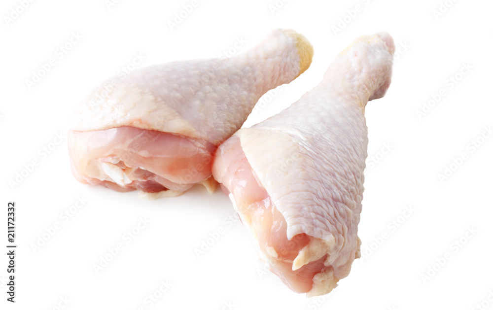 raw chicken legs over white