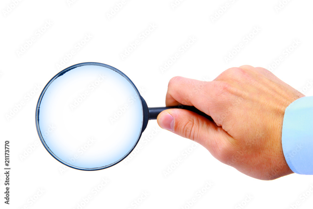 Magnifying glass in hand isolated on white background.