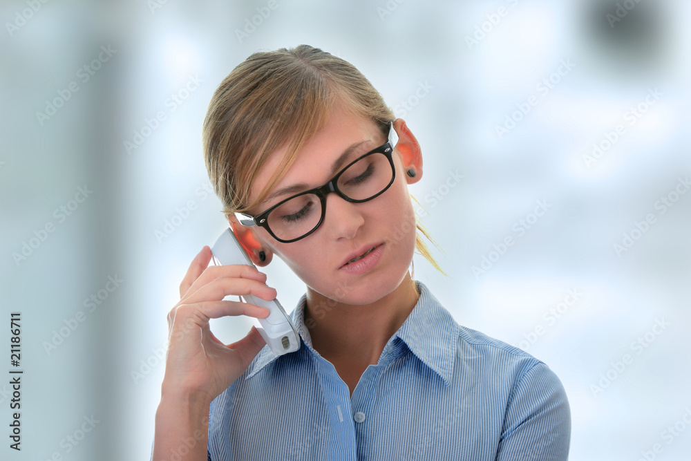 Portrait of a thoughtful young woman with phone Portrait of a thoughtful young woman with phone