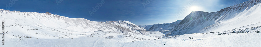 Panorama of mountains in winter. Siberia. Altai.
