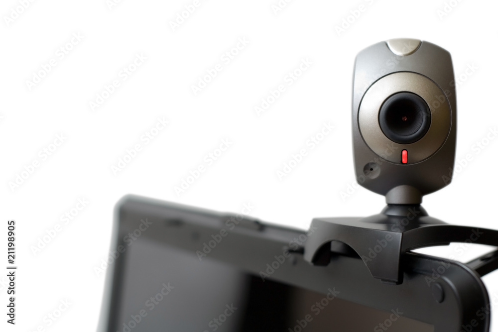 Web camera on laptop staring at you Web camera on laptop staring at you
