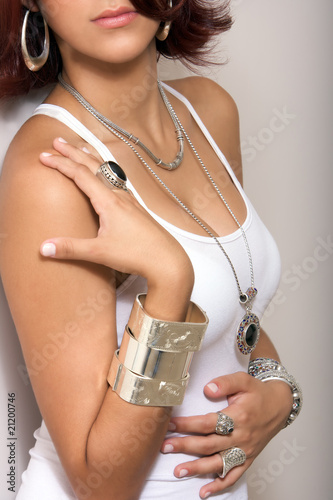 female model wearing silver jewelry earrings necklace pendant