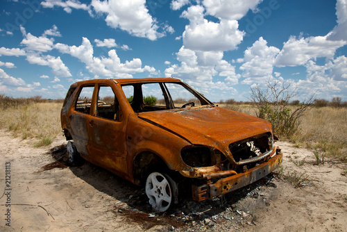Recently burned cars in the desert of Kalahari