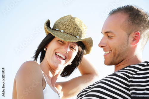 Portrait of a happy young couple having fun outdoors.