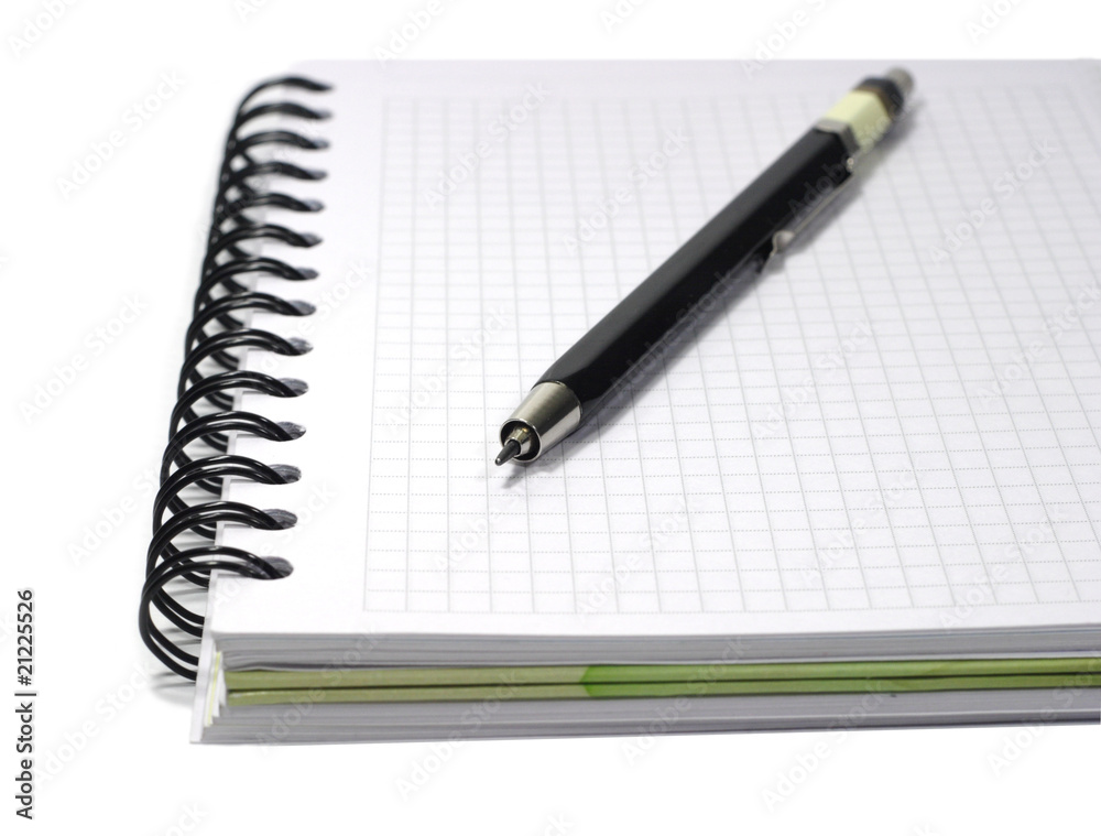notebook and mecanical pencil isolated on white notebook and mecanical pencil isolated on white