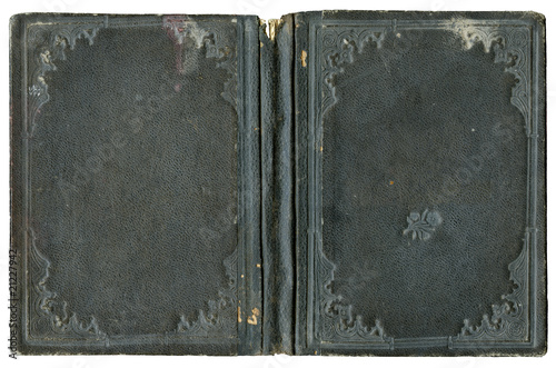 Old open book cover in leather with abstract and flourish embossed decorations - circa 1880 - isolated on white