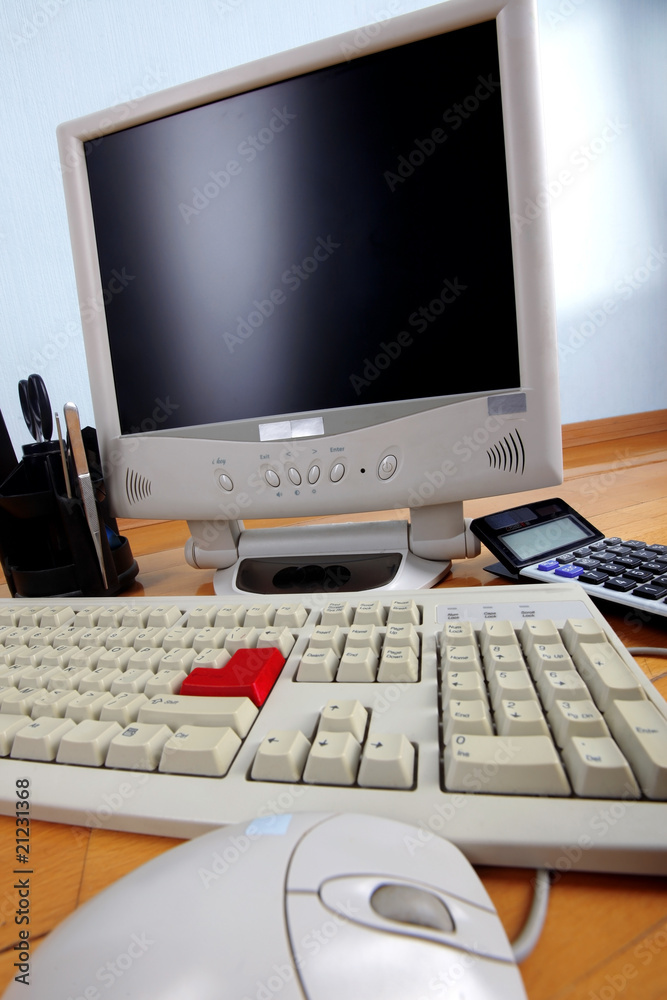 classic work place - keyboard and monitor at table