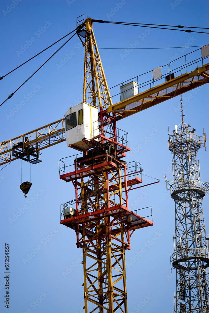 Naklejka premium Tower Crane under blue sky - Modern construction
