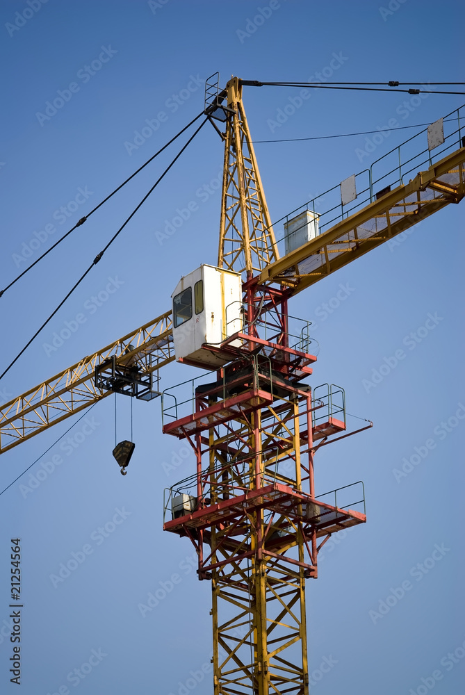 Tower Crane under blue sky at the Construction site Tower Crane under blue sky at the Construction site