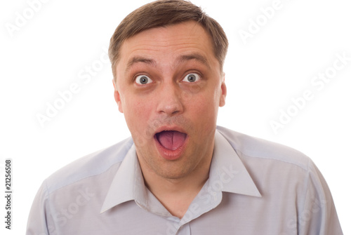surprised by a man standing on a white background