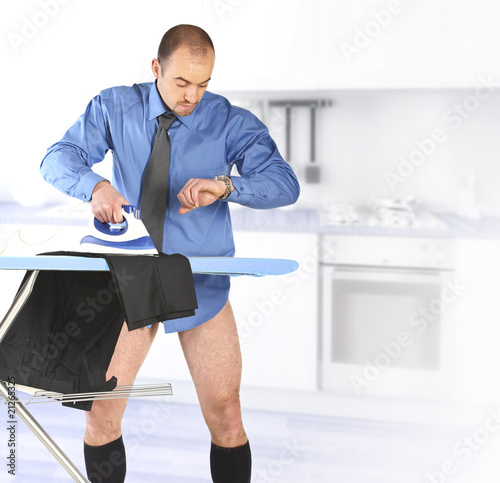 businessman ironing his trouser