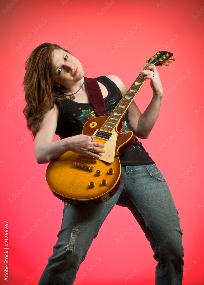 Rocker Girl Musician Electric Guitar Player on hot pink Rocker Girl Musician Electric Guitar Player on hot pink