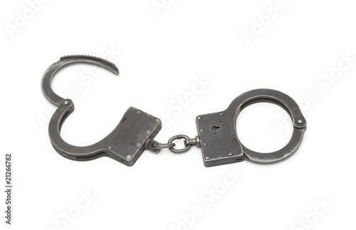 A pair of black steel handcuffs