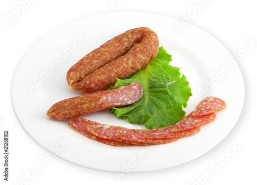Plate with sausage and salad