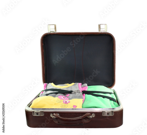 Opened old suitcase isolated on white