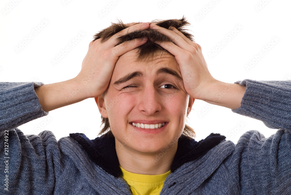 beautiful teenager in a blue jacket is frustration on a white ba beautiful teenager in a blue jacket is frustration on a white ba
