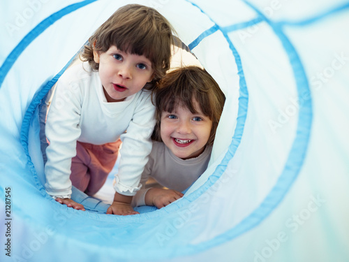 two little girls playing in kindergarten