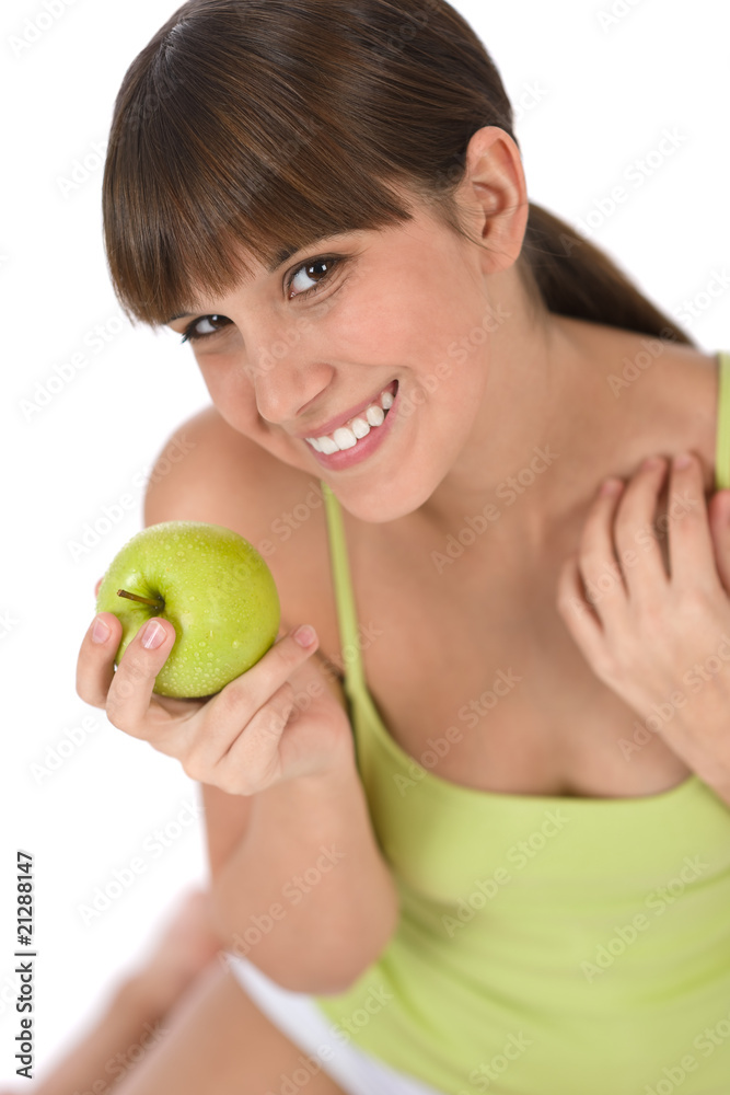 Happy female teenager with healthy apple Happy female teenager with healthy apple