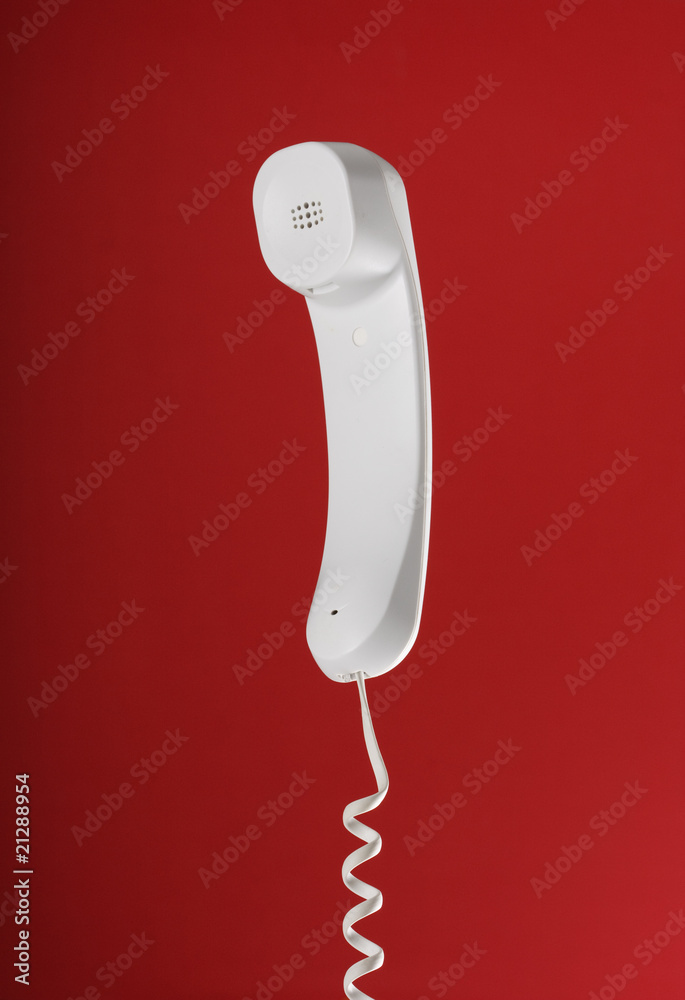 telephone receiver on cord. telephone receiver on cord.