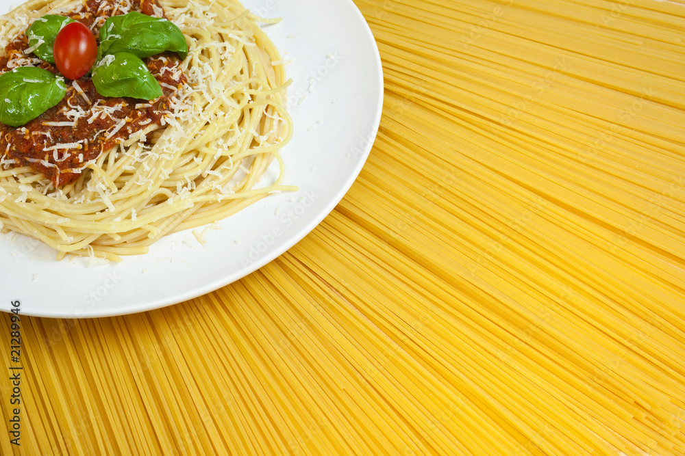Plate of Spaghetti Bolognese on A Sunny Display of Dried Pasta Plate of Spaghetti Bolognese on A Sunny Display of Dried Pasta