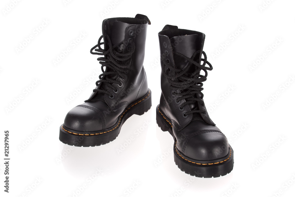 Military style black boots isolated on white background Military style black boots isolated on white background