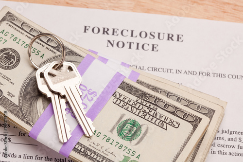 House Keys, Stack of Money and Foreclosure Notice photo