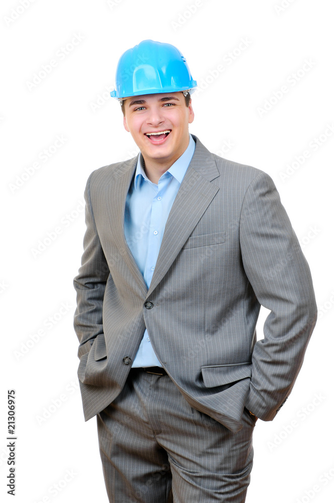 Happy engineer with blue hard hat standing confidently Happy engineer with blue hard hat standing confidently