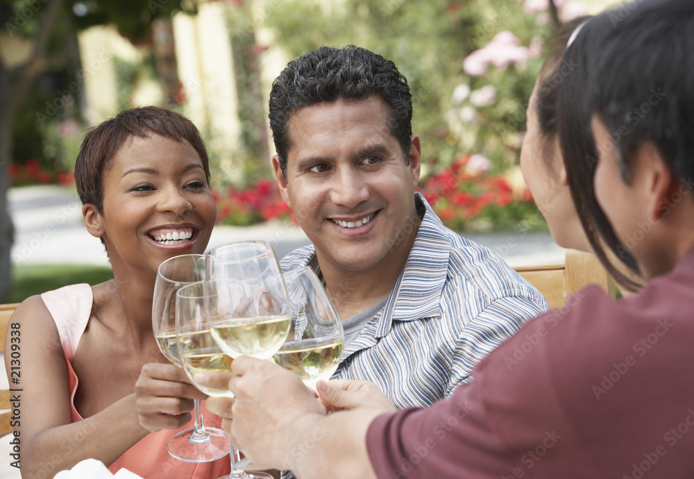 friends drinking wine outdoors head and shoulders friends drinking wine outdoors head and shoulders