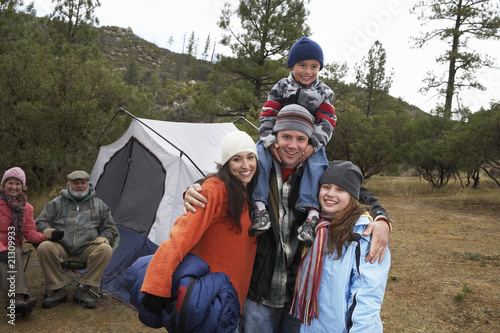 family with children (7-12) camping (portrait)