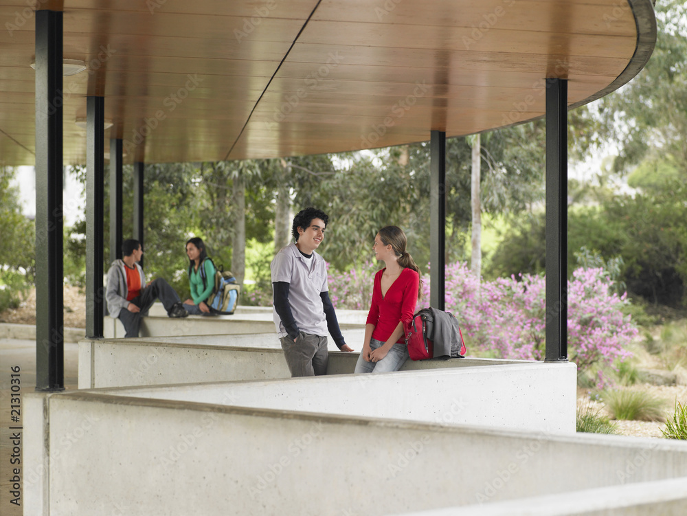 students talking in outdoor pavilion students talking in outdoor pavilion