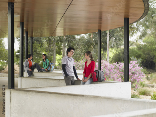 Canvas Print students talking in outdoor pavilion