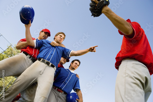 Photography baseball players arguing on field (low angle view)