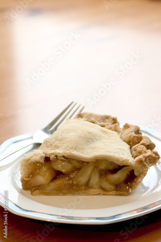 Slice of chunky apple pie
