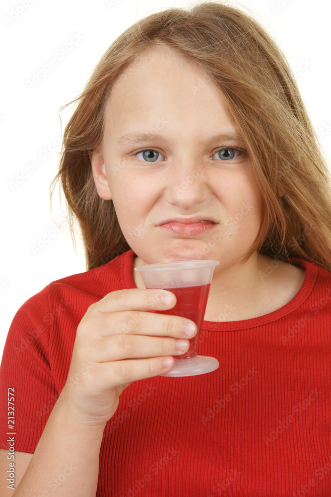 young girl taking medicine young girl taking medicine