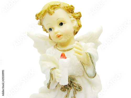 angel miniature holding a candle