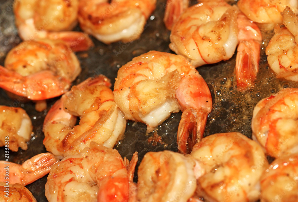 Frying pan with lots of shrimps scampi Frying pan with lots of shrimps scampi