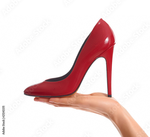 Woman footwear standing on a hand on a white background