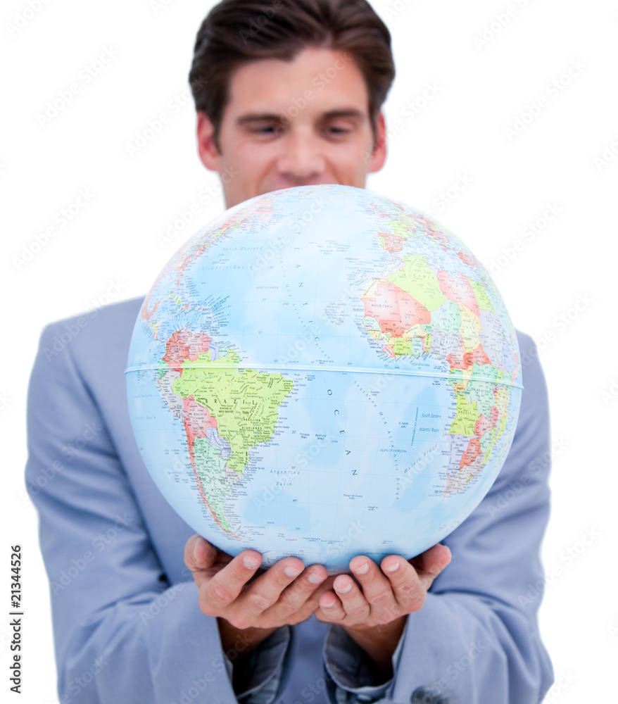 Portrait of an ambitious man holding a terrestrial globe Portrait of an ambitious man holding a terrestrial globe