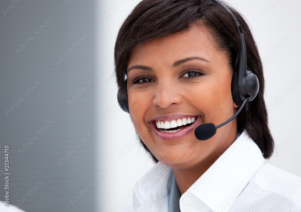 Portrait of an ethnic customer service agent at work Portrait of an ethnic customer service agent at work