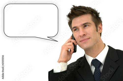 Elegant executive smilling with a cell phone and a white callout