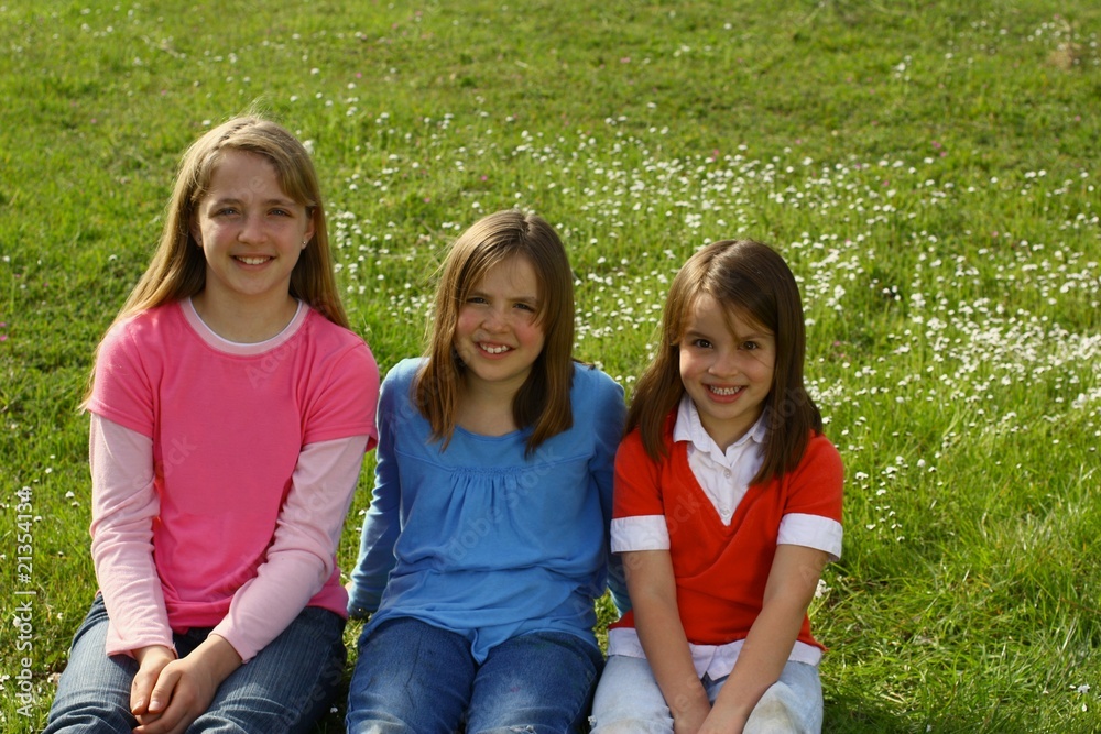 Three sisters enjoying the new springtime weather together.