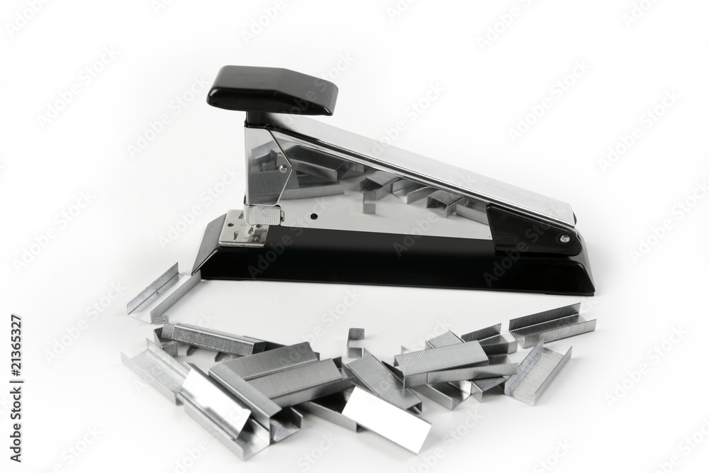 Stapler on silver chrome and black over white Stapler on silver chrome and black over white