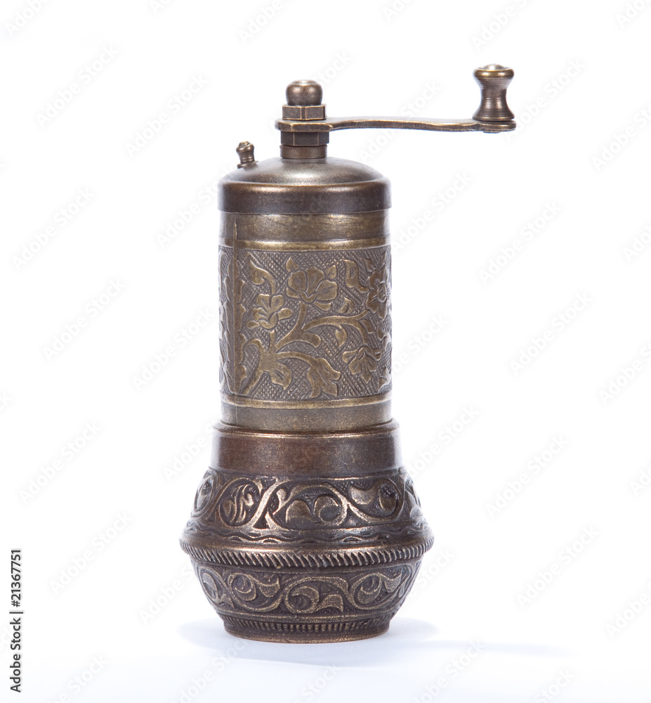 Pepper or coffee grinder isolated on a white Pepper or coffee grinder isolated on a white