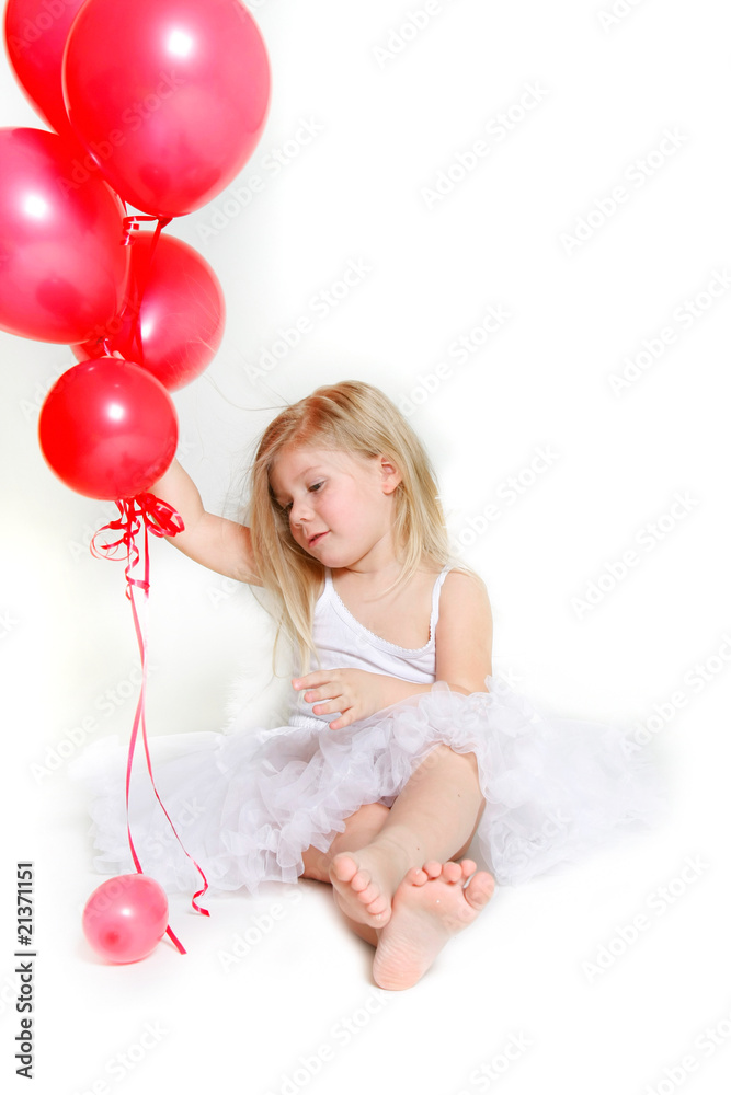 studio shot of little girl with red balloons studio shot of little girl with red balloons