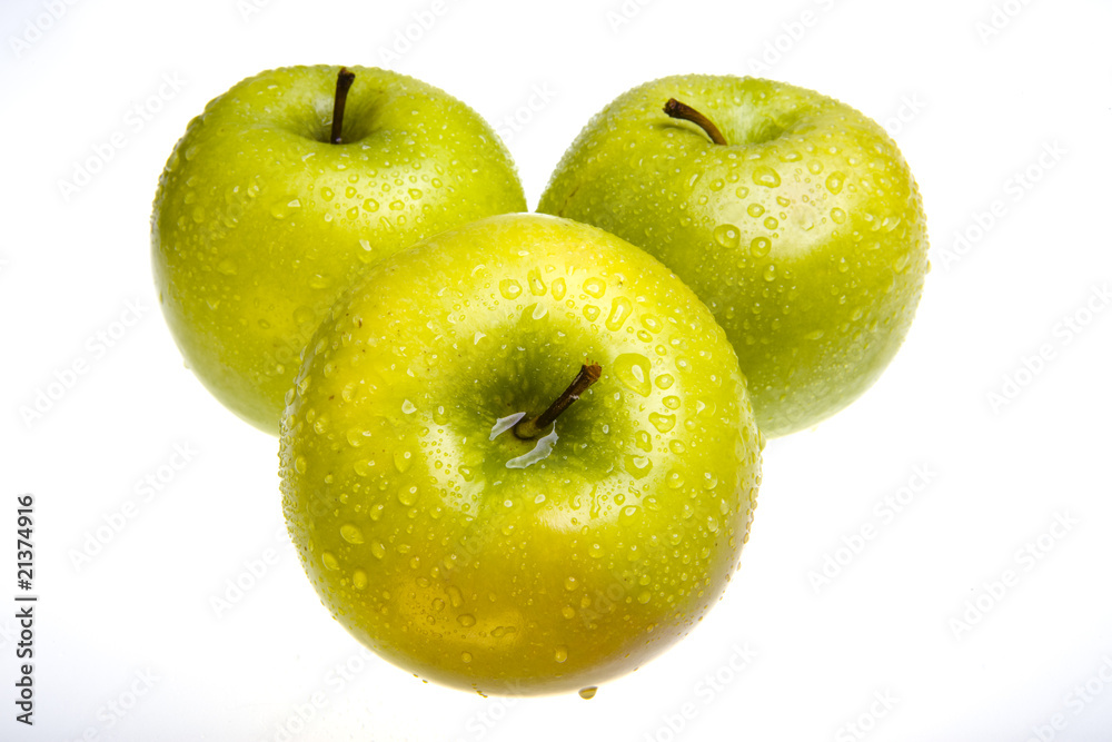 Three juicy apples lay on white background Three juicy apples lay on white background