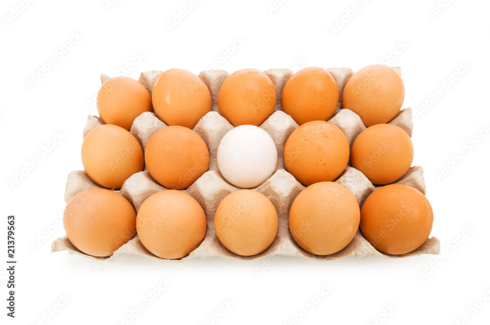 Stand out of crowd concept with eggs on white Stand out of crowd concept with eggs on white
