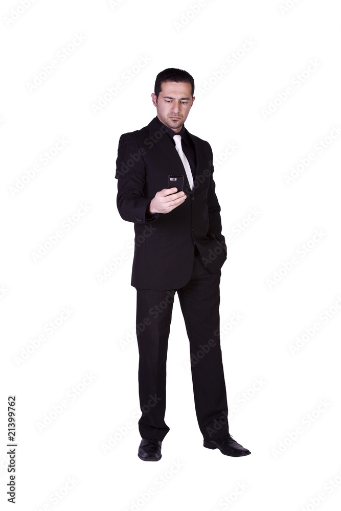 Businessman Texting On His Cell Phone Businessman Texting On His Cell Phone